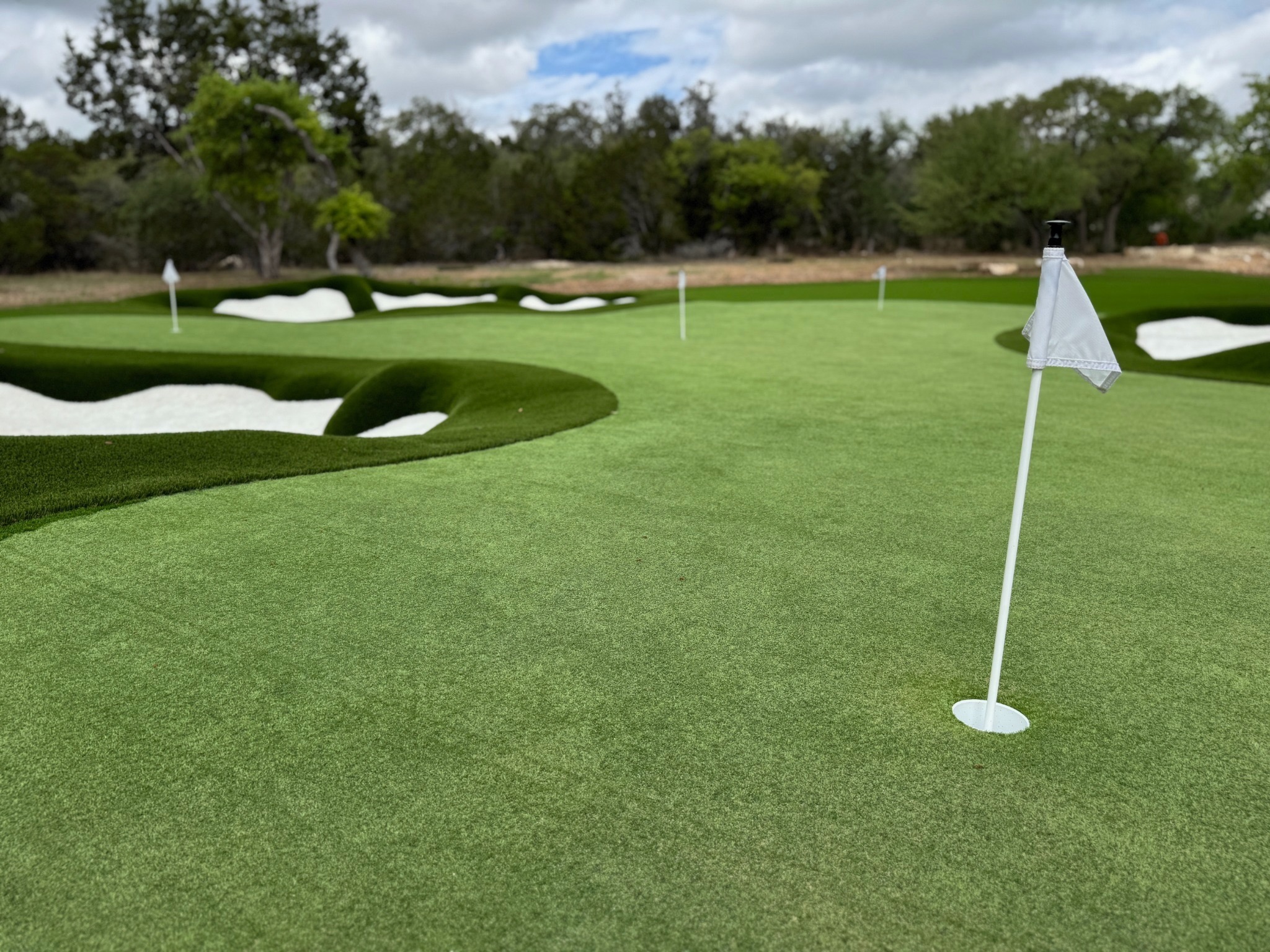 Luxury resort-style outdoor living space with pool and covered pavilion